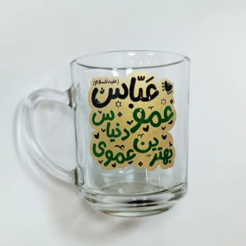 لیوان شیشه ای دسته دار همراه با چاپ عمو عباس بهترین عموی دنیاس